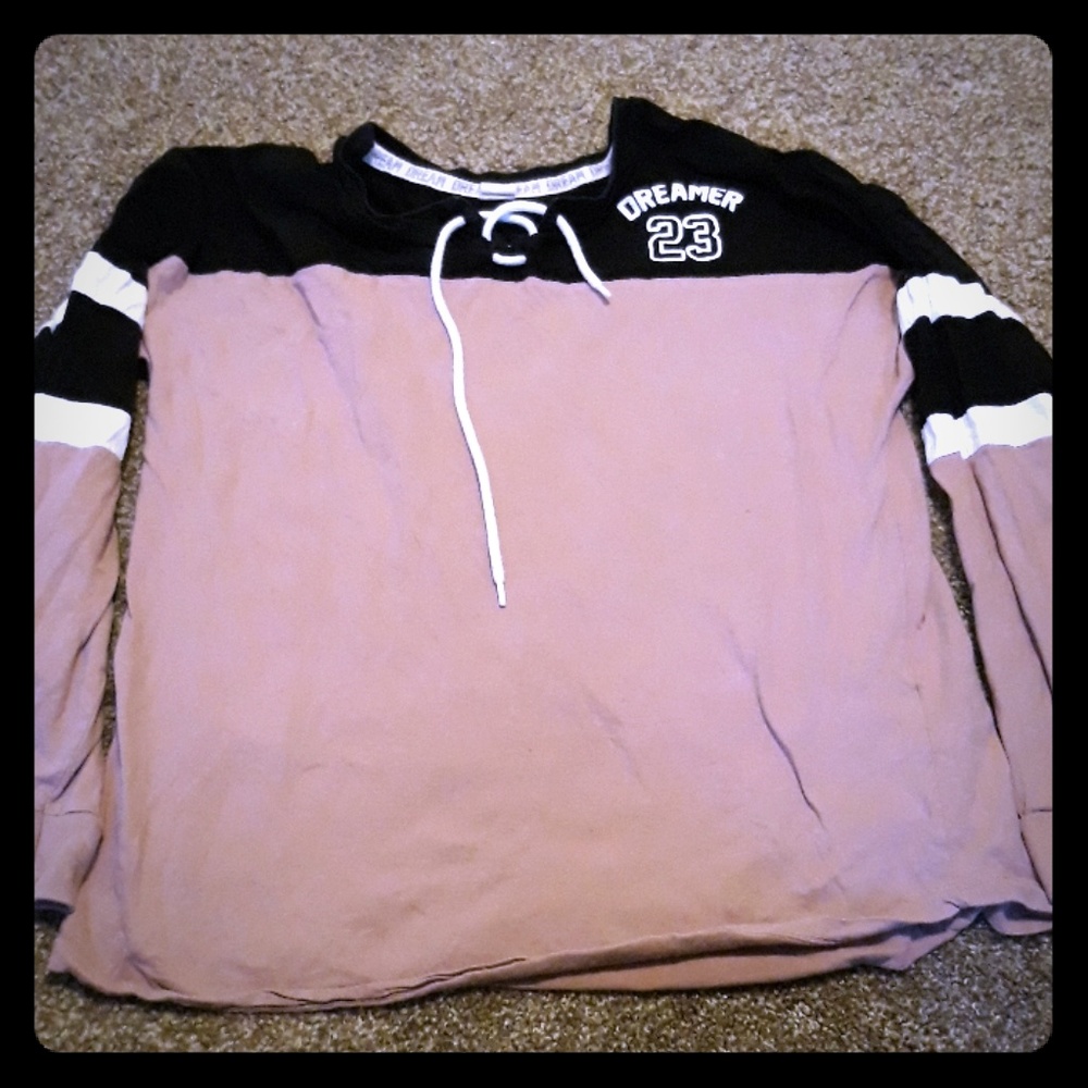 thin long sleeve sweater that is pink and black